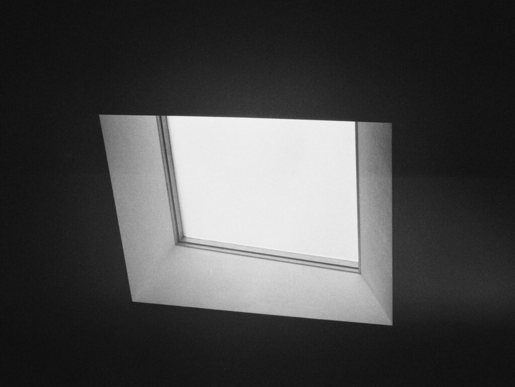 View of skylight from below on overcast day